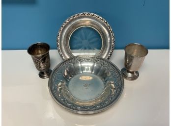 Four small pieces of silver,