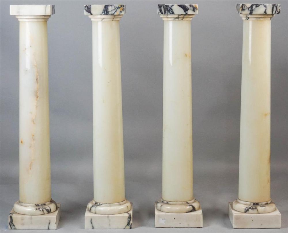 FOUR SMALL PILLARS WITH ONYX