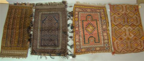 FOUR SMALL RUGS INCLUDING THREE