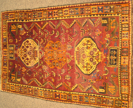 FOUR SMALL RUGS INCLUDING THREE