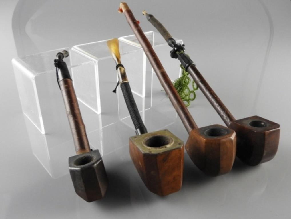 FOUR SMOKING PIPESAll similar, with