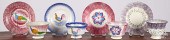 FOUR SPATTERWARE CUPS AND SAUC