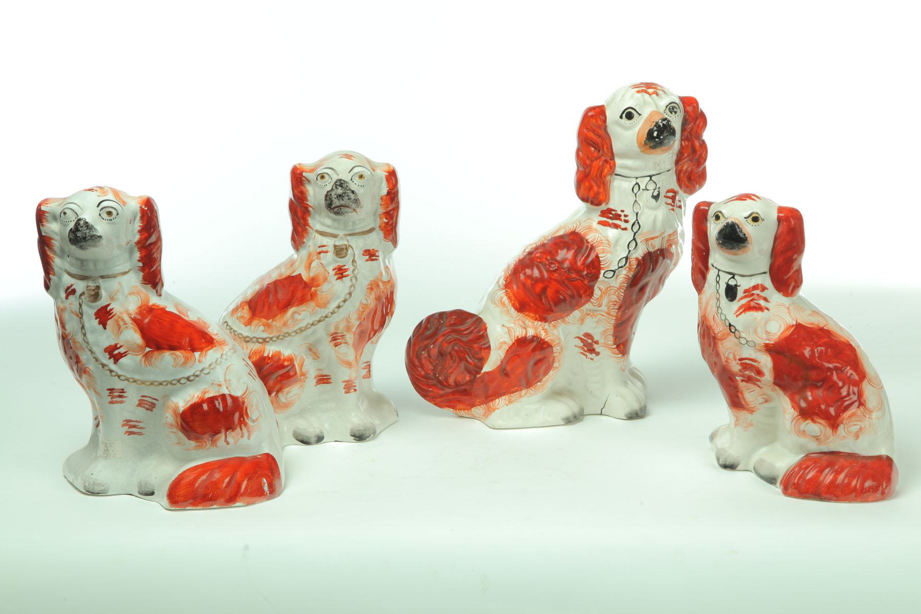 FOUR STAFFORDSHIRE DOGS. 