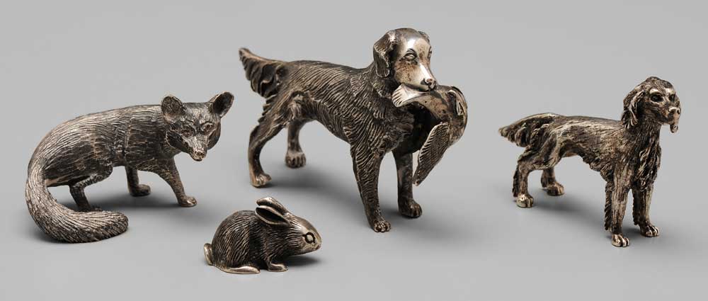 Four Sterling Animals one dog
