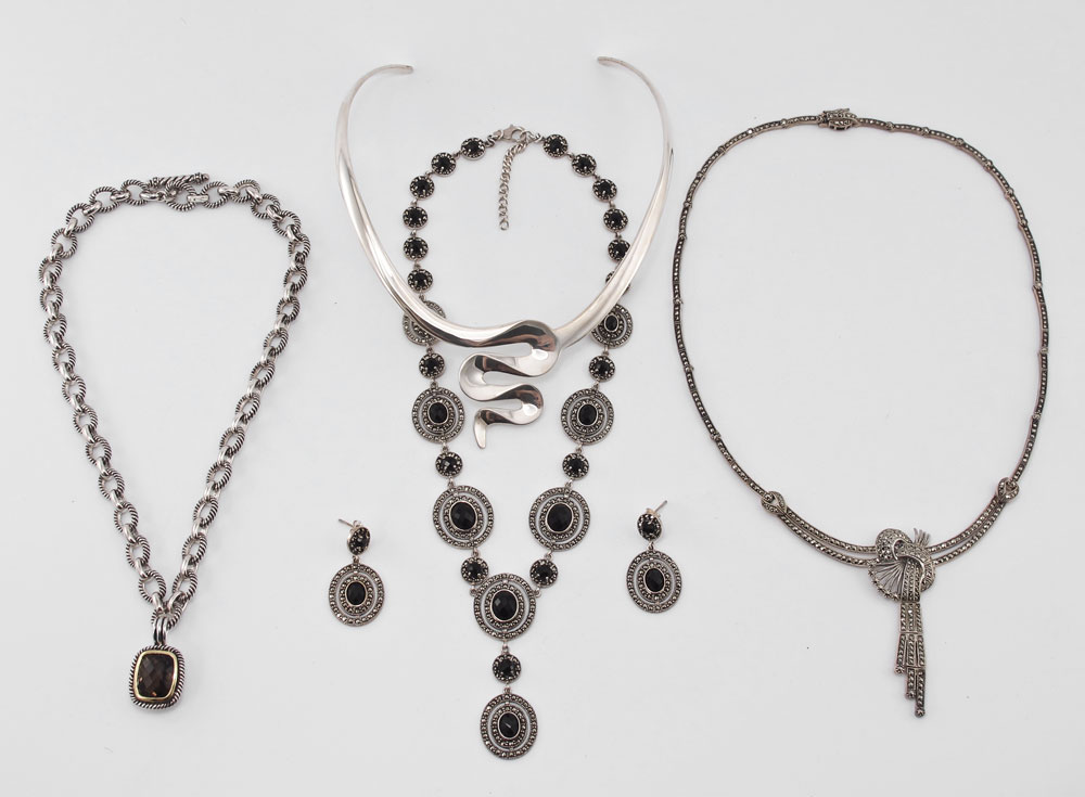 FOUR STERLING NECKLACES: 1) DDD