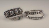 FOUR STERLING SILVER BRACELETS