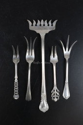 FOUR STERLING SILVER FLATWARE