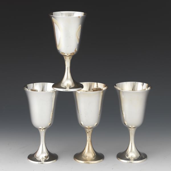 FOUR STERLING SILVER GOBLETS BY