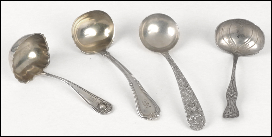FOUR STERLING SILVER LADLES.