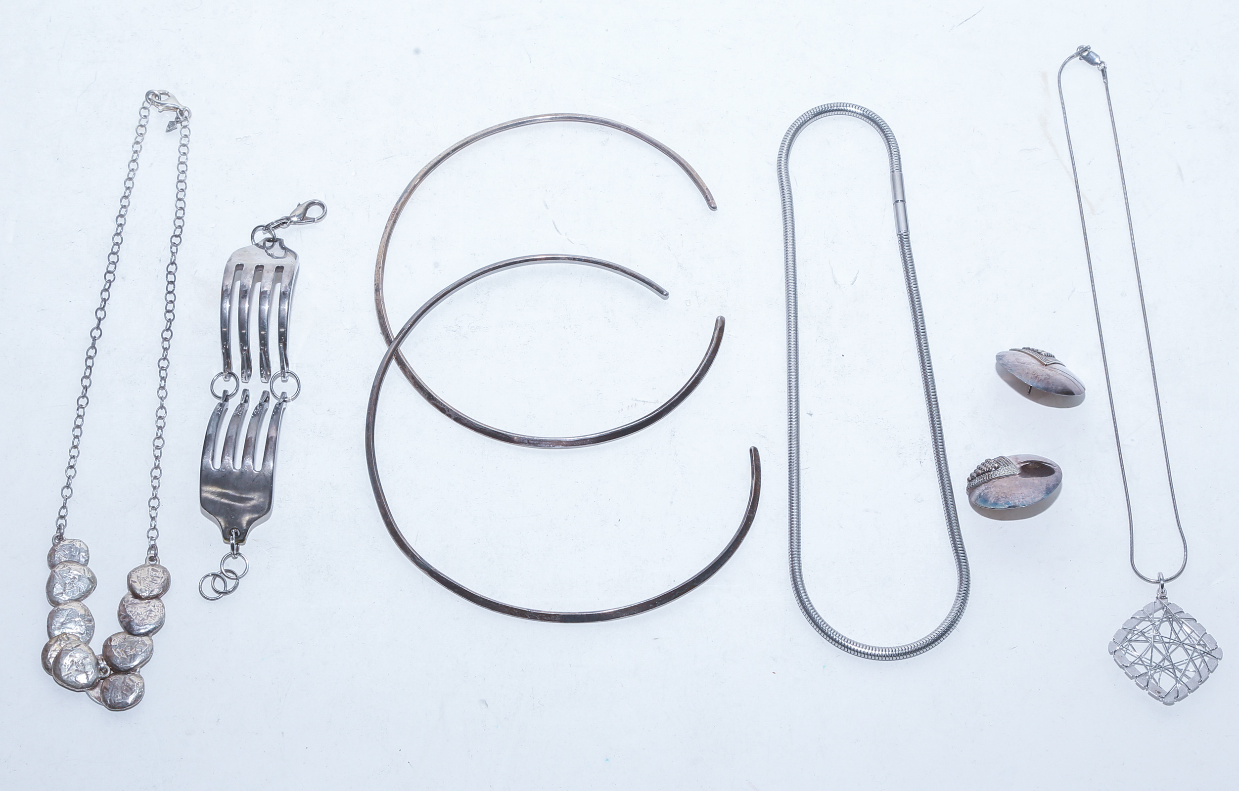 FOUR STERLING SILVER NECKLACES