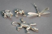 FOUR STERLING SILVER REPTILE A