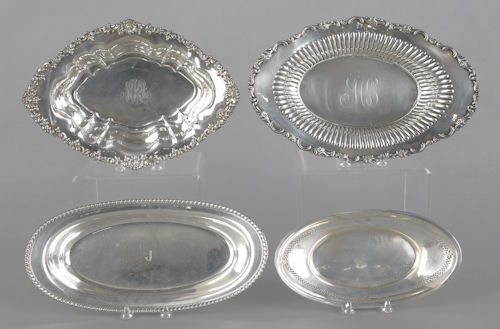 Four sterling silver trays