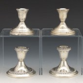 FOUR STERLING SILVER WEIGHTED