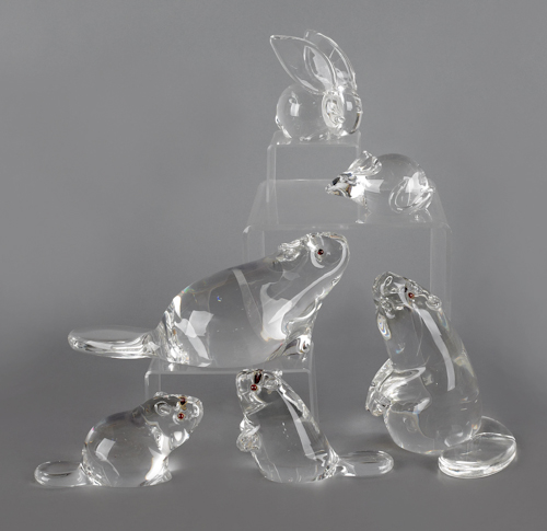 Four Steuben beaver figures