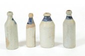 FOUR STONEWARE BOTTLES.  Ameri