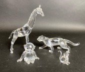 FOUR SWAROVSKI AFRICAN PLAINS