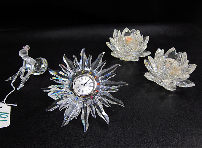 FOUR SWAROVSKI CRYSTALS: (1)