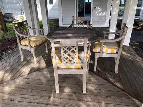 FOUR TEAK WOOD LATTICE ARMCHAIRS