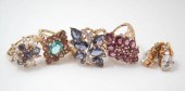 FOUR TEN KARAT GOLD RINGS AND