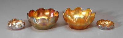 Four Tiffany favrile bowls: all