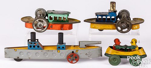 FOUR TIN BOAT PENNY TOYSFour tin