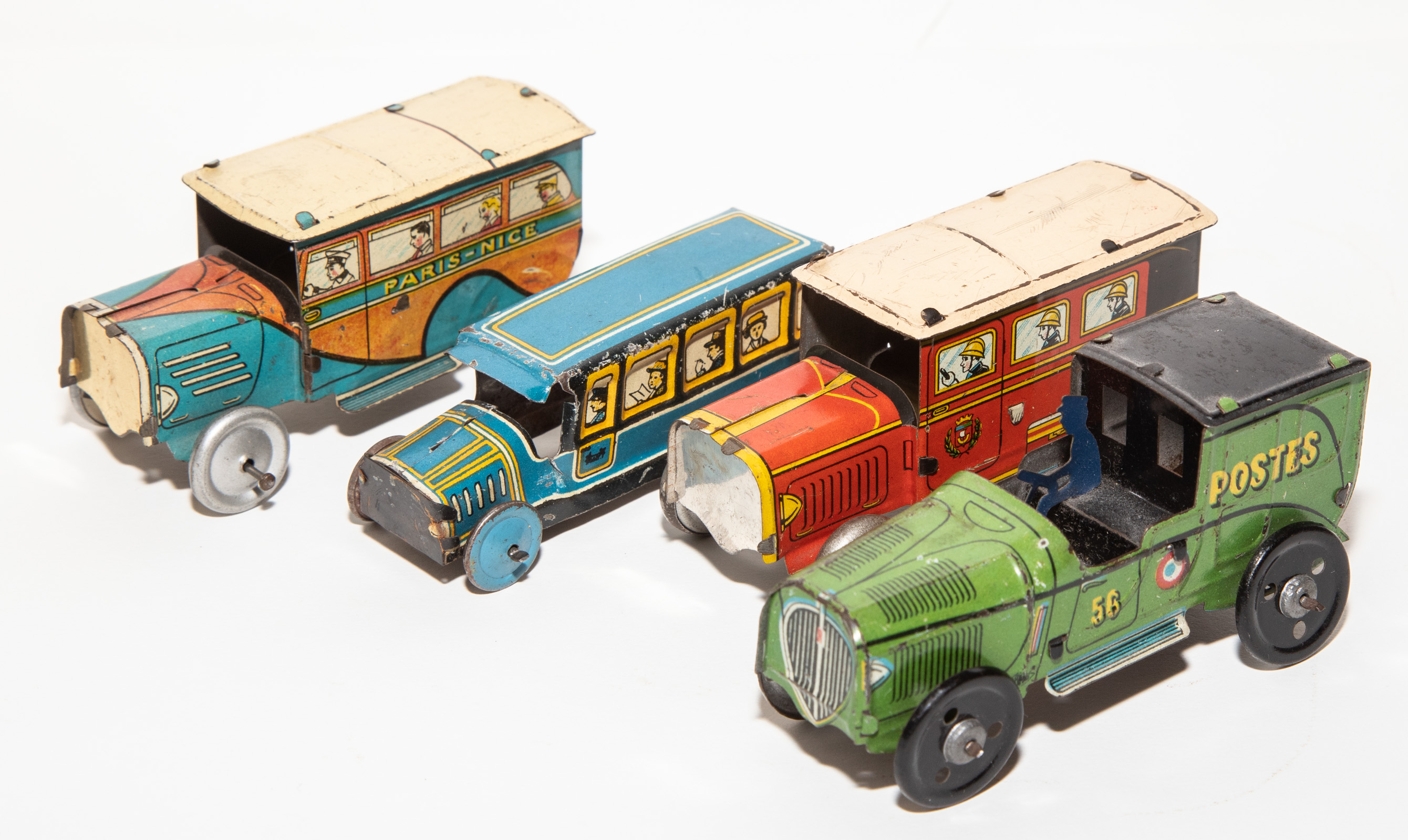 FOUR TIN LITHO PENNY TOY VEHICLES