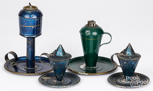 FOUR TOLEWARE FINGER OIL LAMPS,