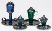 FOUR TOLEWARE FINGER OIL LAMPS