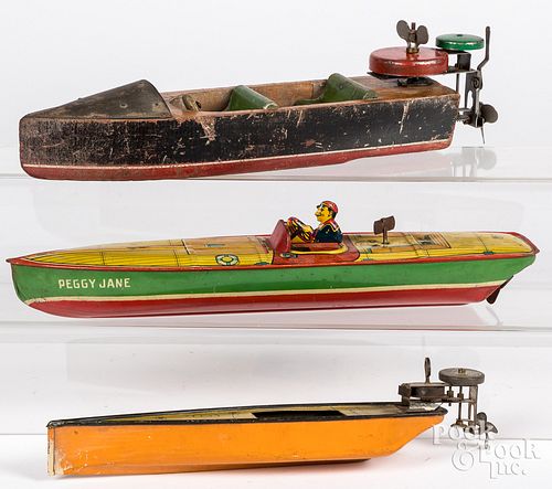 FOUR TOY BOATSFour toy boats, to