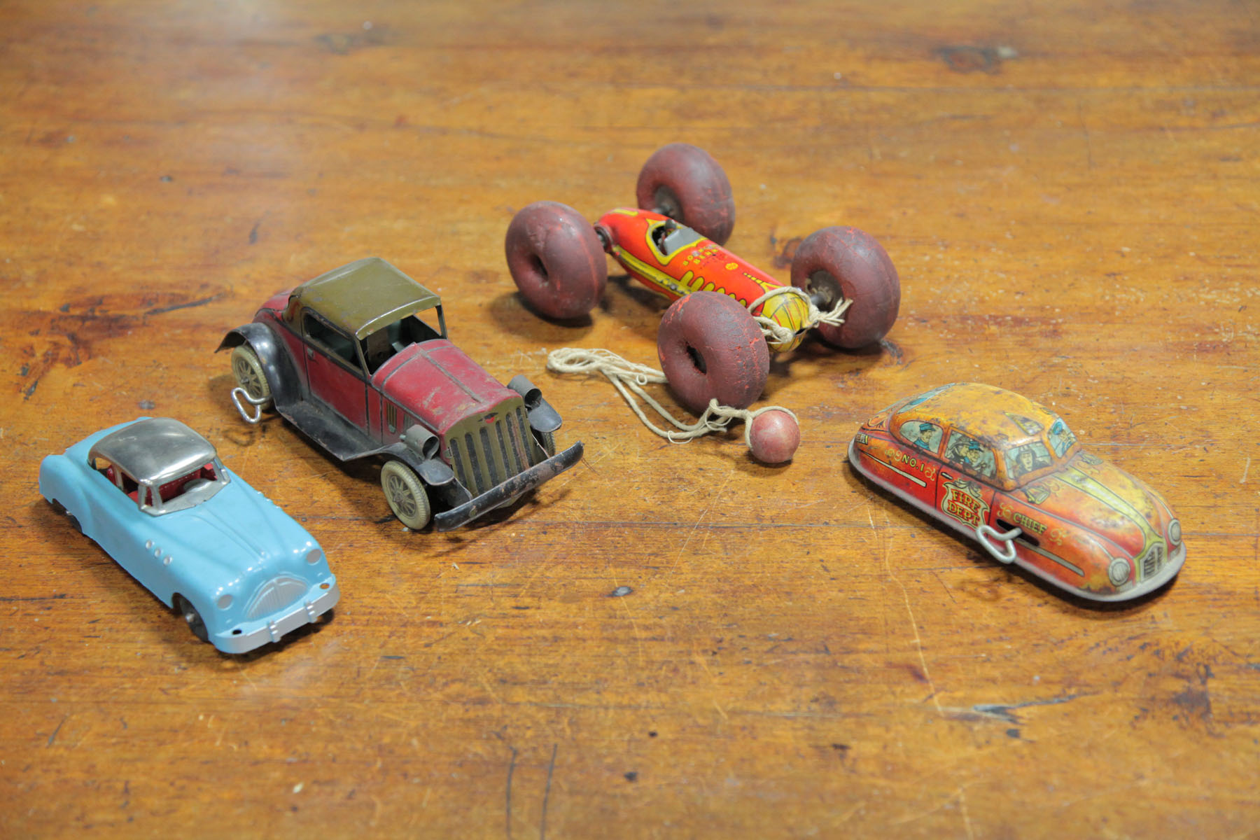 FOUR TOY CARS.    American 