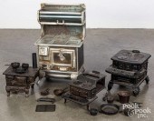 FOUR TOY STOVESFour toy stoves