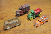 FOUR TOY TRUCKS.  American  ea