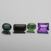 FOUR UNMOUNTED 15.40 CT TOTAL