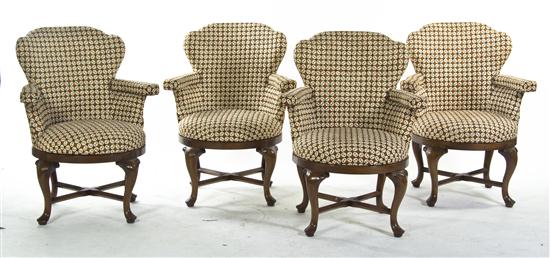 Four Upholstered Wingback Armchairs