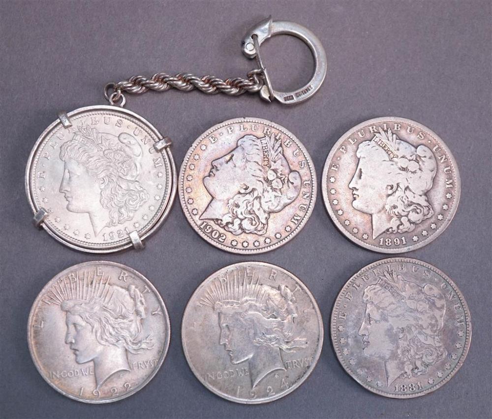 FOUR U.S. MORGAN SILVER DOLLARS