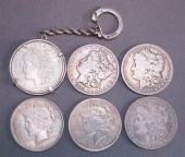 FOUR U.S. MORGAN SILVER DOLLAR