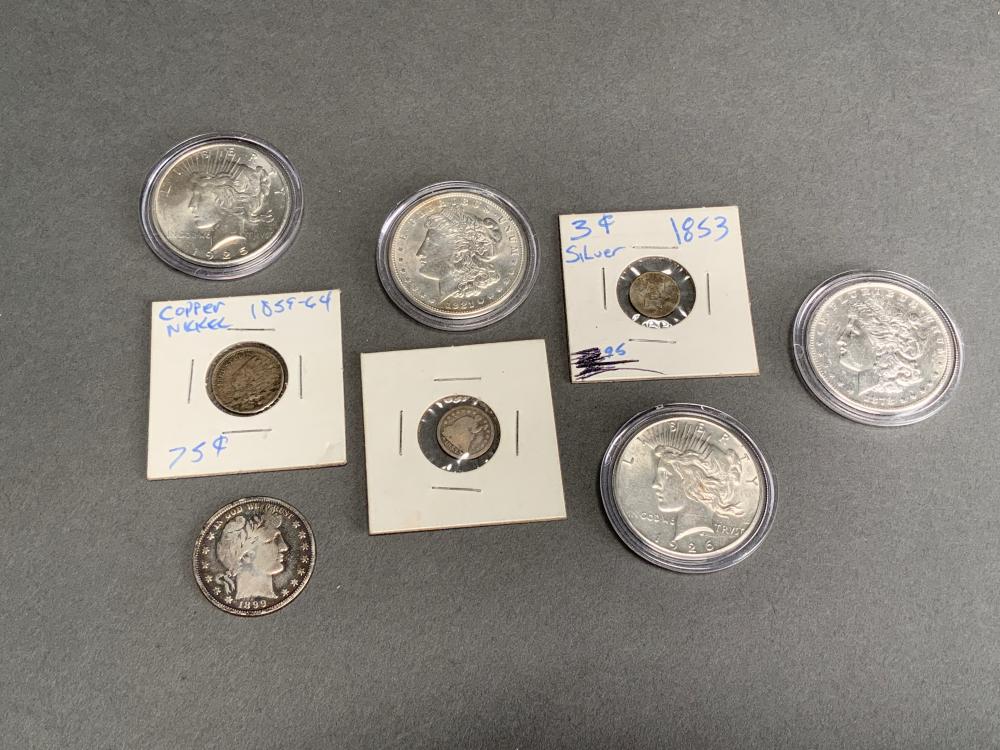 FOUR U.S. SILVER DOLLARS, A 1899