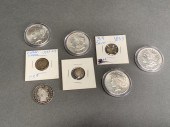 FOUR U.S. SILVER DOLLARS, A 18