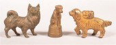 FOUR VARIOUS CAST IRON DOG STI