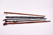 FOUR VARIOUS HARDWOOD WALKING