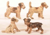 FOUR VARIOUS HUBLEY DOG FIGURE