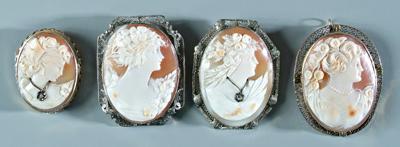 Four vintage gold cameo brooches: