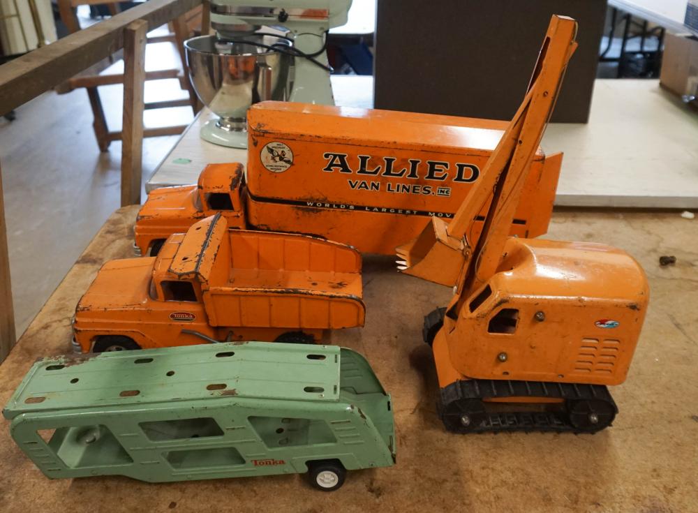 FOUR VINTAGE METAL TOY TRUCKS