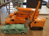 FOUR VINTAGE METAL TOY TRUCKS