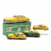 FOUR VINTAGE TIN LITHO CABS 19