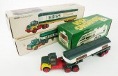 FOUR VINTAGE TOY HESS TRUCKSFo