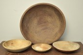 FOUR VINTAGE WOODENWARE BOWLS.