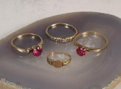 FOUR VINTAGE YELLOW GOLD RINGS