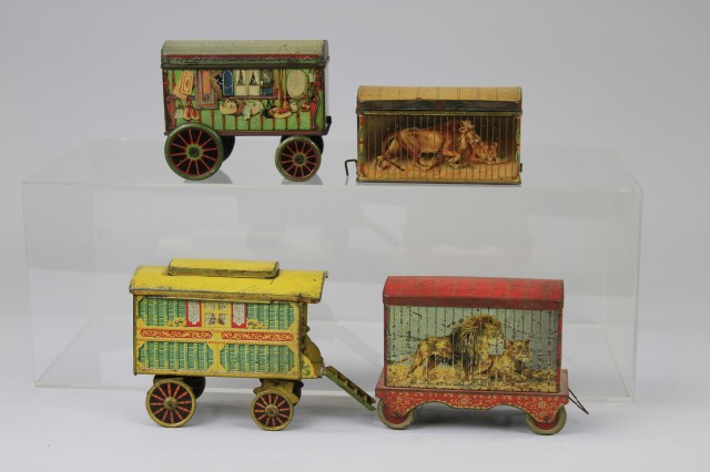 FOUR WAGON BISCUIT TINS