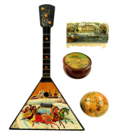 FOUR WOODEN AND OTHER DECORATI